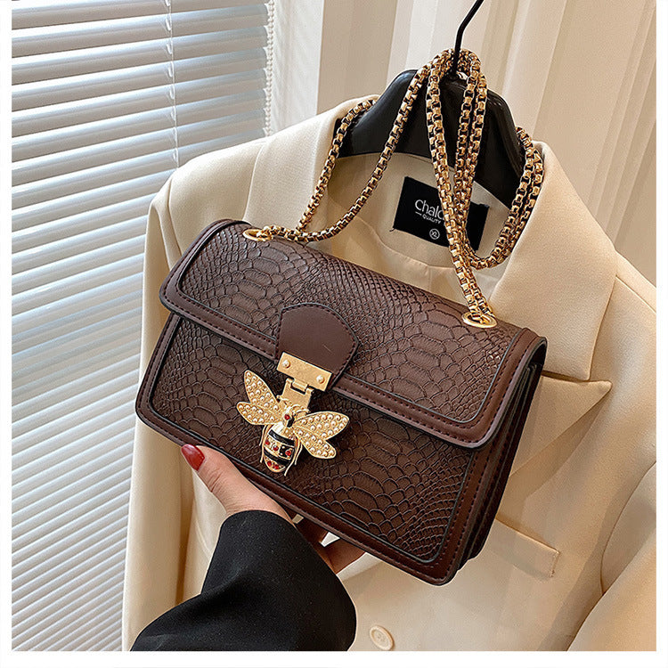 fashion-forward chain shoulder messenger bag